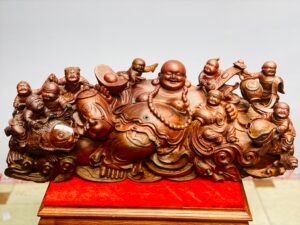Di lặc chín tiểu ngồi tiền gỗ cẩm.