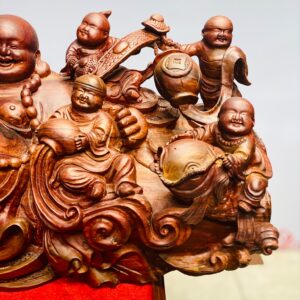 Di lặc chín tiểu ngồi tiền gỗ cẩm.