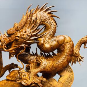 Rồng trấn chum gỗ hương ta.