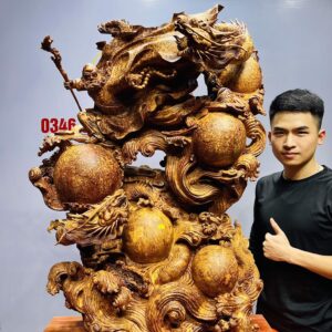 Đạt Ma múa võ song long gỗ nu hương.