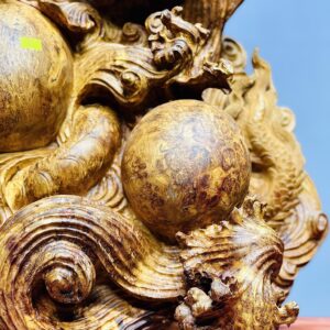 Đạt Ma múa võ song long gỗ nu hương.