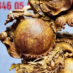 Đạt Ma múa võ song long gỗ nu hương.