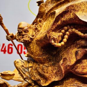 Đạt Ma múa võ song long gỗ nu hương.