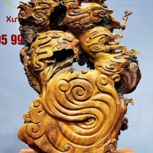 Đạt Ma múa võ song long gỗ nu hương.
