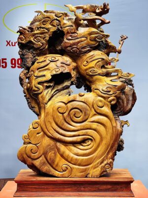 Đạt Ma múa võ song long gỗ nu hương.