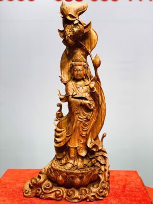 Quan Âm cầm ngọc như ý gỗ sưa.