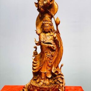 Quan Âm cầm ngọc như ý gỗ sưa.