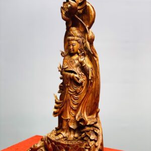 Quan Âm cầm ngọc như ý gỗ sưa.