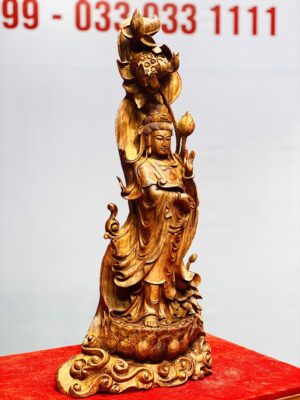Quan Âm cầm ngọc như ý gỗ sưa.