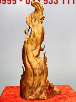 Quan Âm cầm ngọc như ý gỗ sưa.