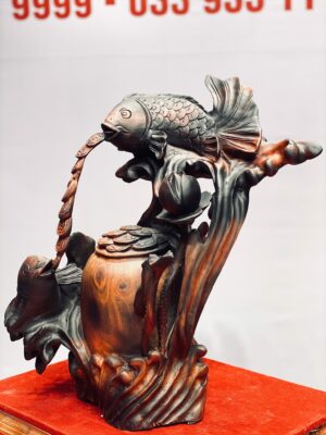 Song ngư chấn chum tiền gỗ trắc.
