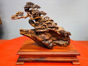 Tiểu cảnh nhà sàn sưa đỏ.