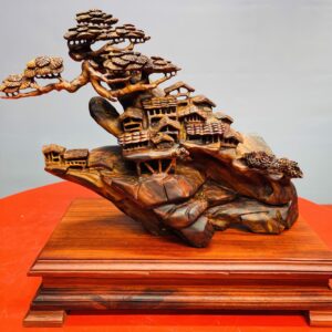 Tiểu cảnh nhà sàn sưa đỏ.