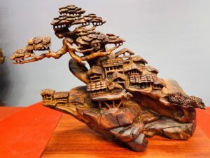 Tiểu cảnh nhà sàn sưa đỏ.