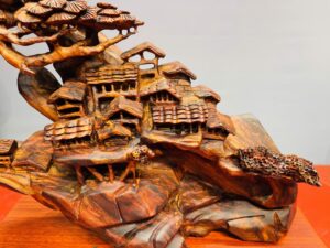 Tiểu cảnh nhà sàn sưa đỏ.