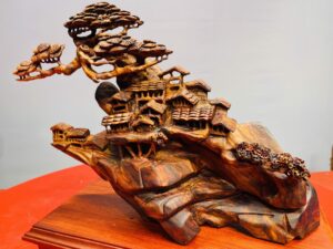 Tiểu cảnh nhà sàn sưa đỏ.