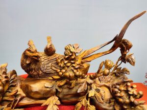 Chim trĩ hoa phù dung gỗ sưa.