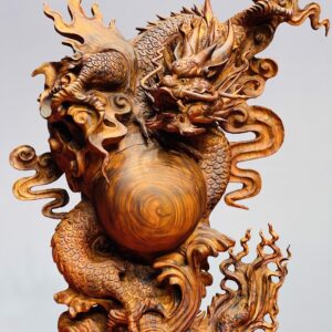 Rồng trấn ngọc gỗ sưa.