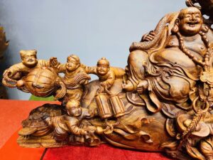 Di lặc cửu tiểu hoa sen nghê sưa.