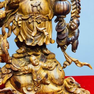 Di Lặc ngũ tiểu vác đào sưa.