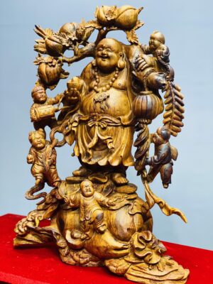 Di Lặc ngũ tiểu vác đào sưa.