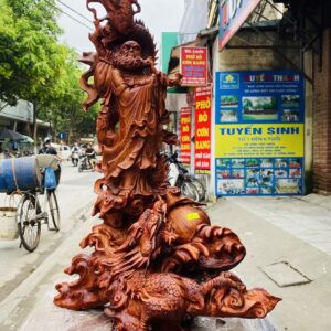Đạt ma quá hải ngự long gỗ sưa đỏ.