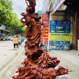 Đạt ma quá hải ngự long gỗ sưa đỏ.