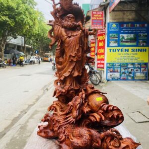 Đạt ma quá hải ngự long gỗ sưa đỏ.