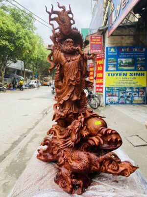 Đạt ma quá hải ngự long gỗ sưa đỏ.