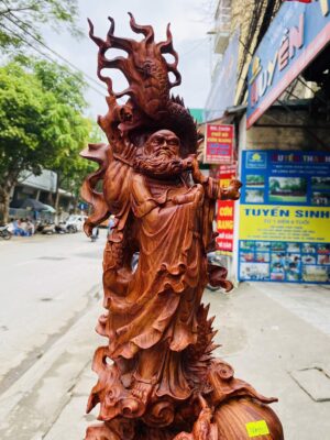 Đạt ma quá hải ngự long gỗ sưa đỏ.