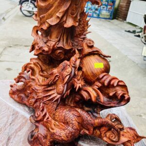 Đạt ma quá hải ngự long gỗ sưa đỏ.