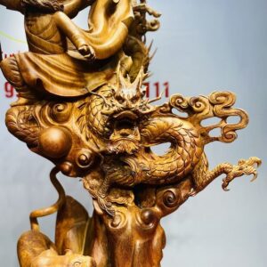 Đạt ma ngọa hổ tàng long gỗ hương.