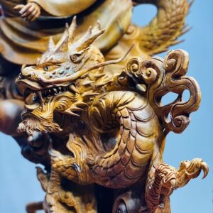 Đạt ma ngọa hổ tàng long gỗ hương.