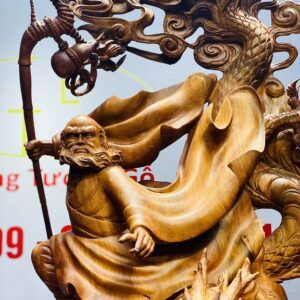Đạt ma ngọa hổ tàng long gỗ hương.