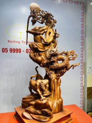 Đạt ma ngọa hổ tàng long gỗ hương.