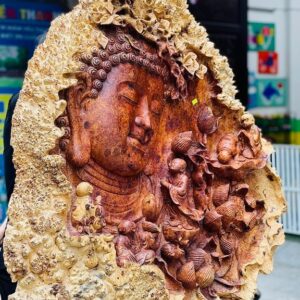 Nhất tâm bái Phật gỗ nu hương