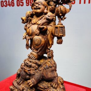 Tượng Di Lạc vác cành đào đứng Nghê Gỗ Sưa