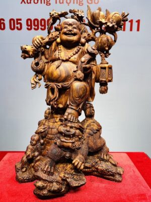 Tượng Di Lạc vác cành đào đứng Nghê Gỗ Sưa