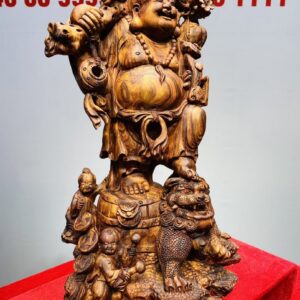 Tượng Di Lạc vác cành đào đứng Nghê Gỗ Sưa
