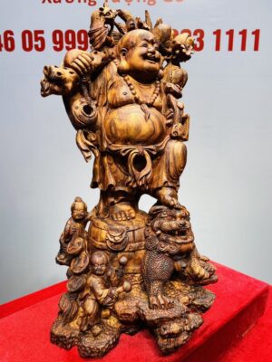 Tượng Di Lạc vác cành đào đứng Nghê Gỗ Sưa