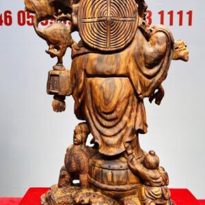 Tượng Di Lạc vác cành đào đứng Nghê Gỗ Sưa