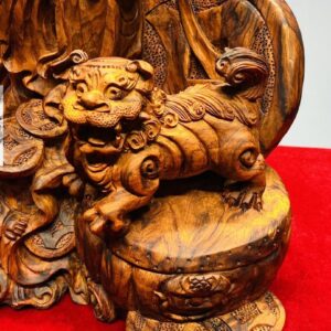 Tượng Di Lạc Nhị Tiểu vác cành đào đứng Nghê Gỗ Sưa