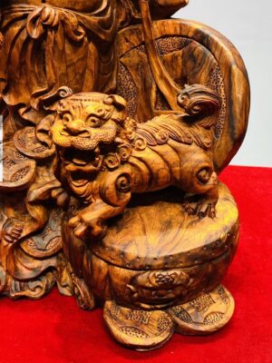 Tượng Di Lạc Nhị Tiểu vác cành đào đứng Nghê Gỗ Sưa