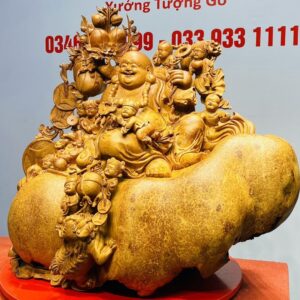 Di Lạc Cửu Tiểu vác cành đào ngồi bao tiền Gỗ Nu Hương