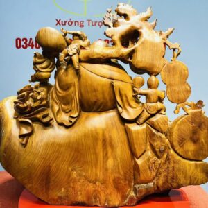 Di Lạc Cửu Tiểu vác cành đào ngồi bao tiền Gỗ Nu Hương
