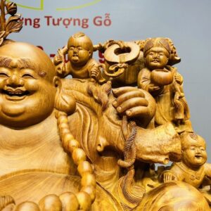 Di Lạc Cửu Tiểu vác cành đào ngồi bao tiền Gỗ Nu Hương