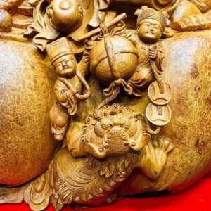 Di Lạc Cửu Tiểu vác cành đào ngồi bao tiền Gỗ Nu Hương