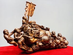 Di Lạc Ngũ Phúc Vác Gậy Như Ý Bên Nghê Gỗ Sưa