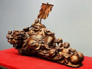 Di Lạc Ngũ Phúc Vác Gậy Như Ý Bên Nghê Gỗ Sưa