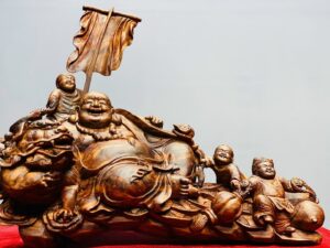 Di Lạc Ngũ Phúc Vác Gậy Như Ý Bên Nghê Gỗ Sưa